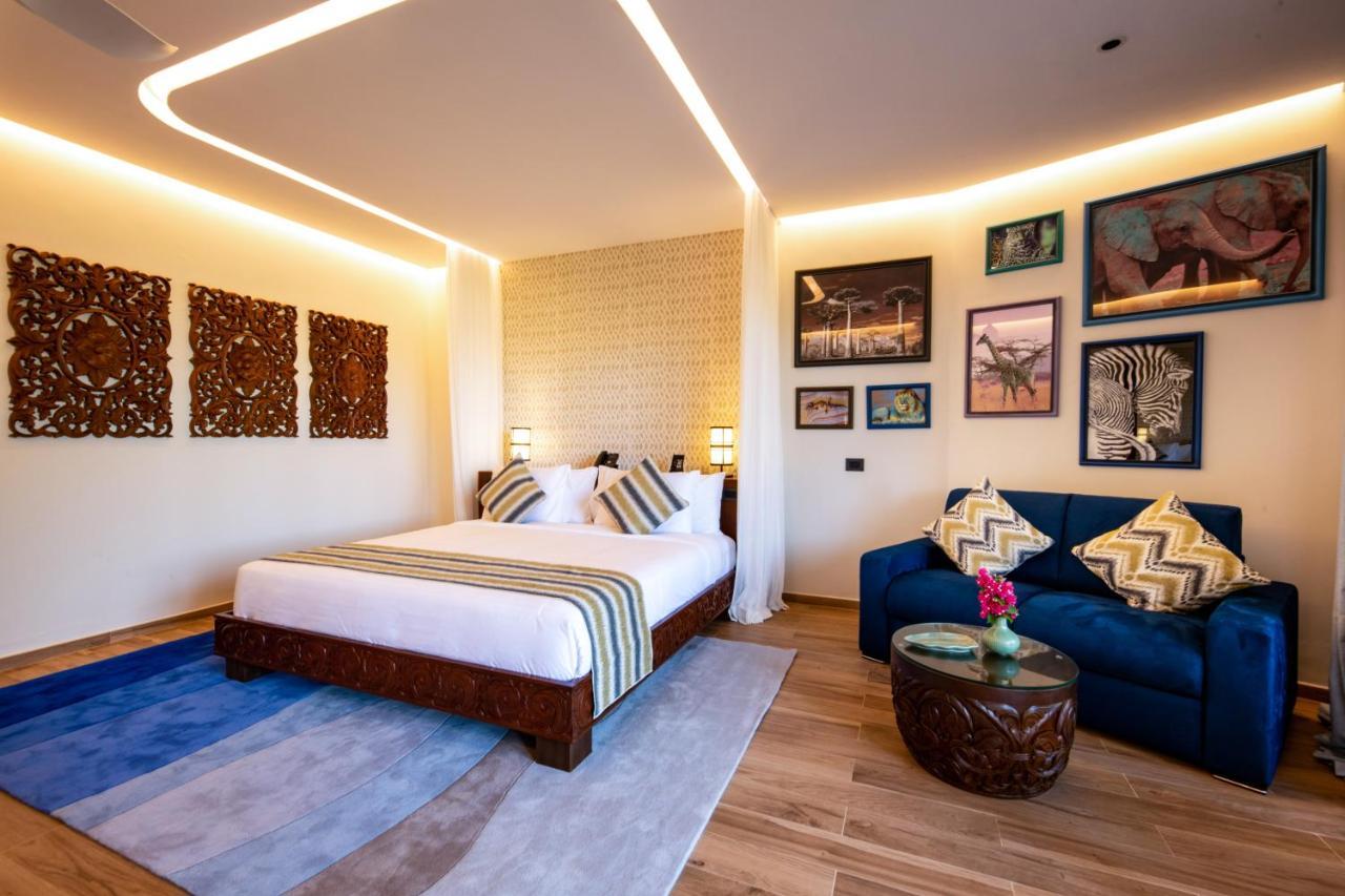 מלון מאטמווה The Mora Zanzibar מראה חיצוני תמונה A bedroom at the hotel